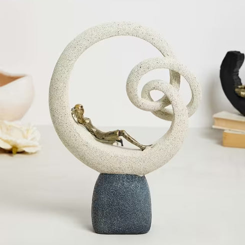 Modern leaning lady figurine