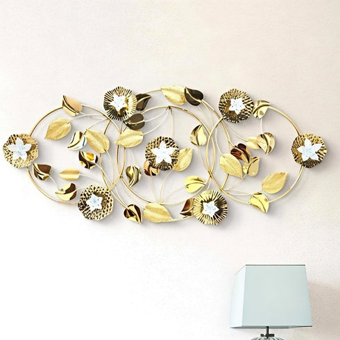 Golden leaf with ring metal wall art