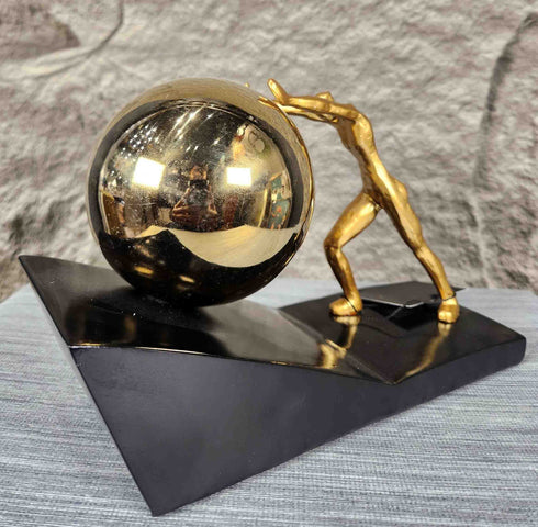 Men Push metal ball Sculpture