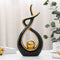 Swirl sculpture- black