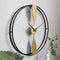 Black ring with golden metal Wall Clock