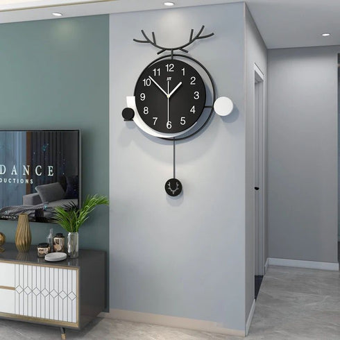 Fancy black and white metal wall clock